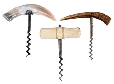 Three Unique Antique Corkscrews of Varying Size and Form
