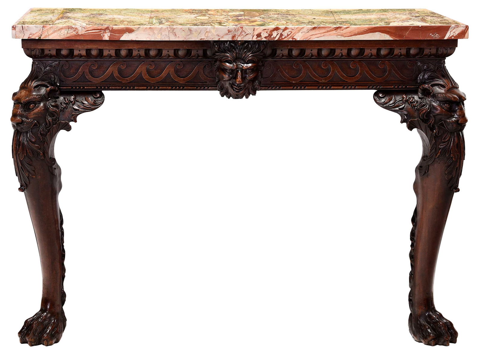 Fine George II Carved Mahogany Satyr Mask Console Table with Rare Fluorite Top: Irish or London, circa 1740, robustly carved in the Roman style with Vitruvian scrolls, egg and dart moldings and deeply rendered masks with lion's paw feet, set with a rare purple, green, and white f