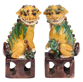 Pair of Chinese Export Yellow Glazed Earthenware Lions