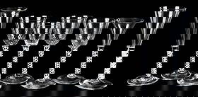 Seven Georgian Opaque Twist Glass Stems: 18th century, of assorted form and function, largest 7-1/2 x 3 x 3 in. Provenance: Collection of John B. and Marie-Teresa Vander Sande, Newbury, Massachusetts