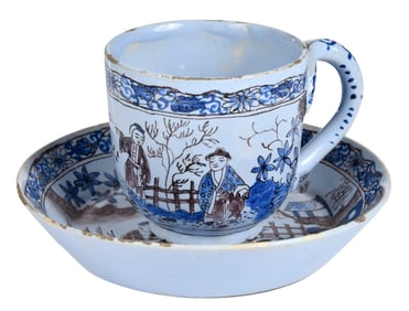 French Faience Blue and Manganese Teacup and Saucer