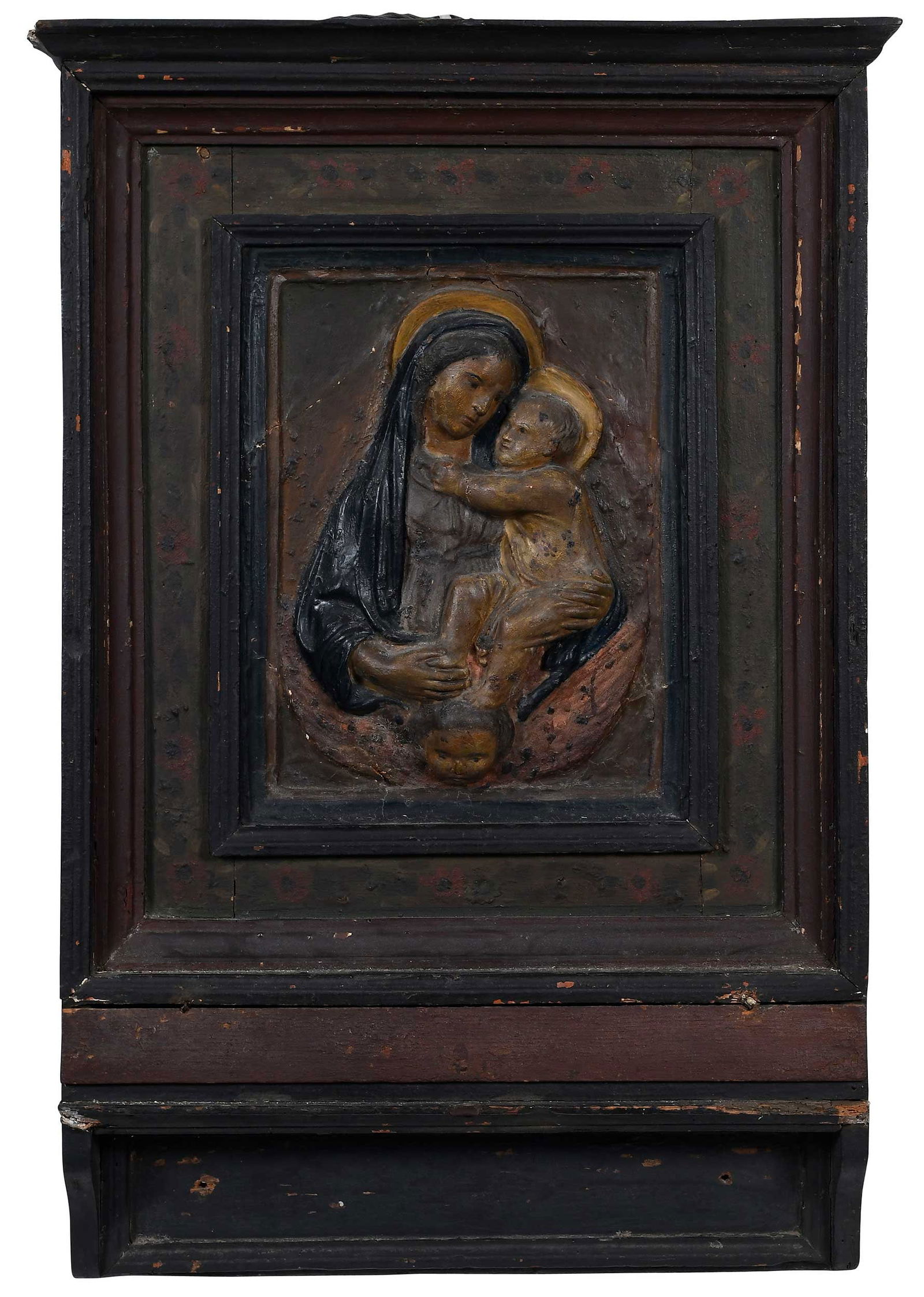 Florentine Style Relief of The Virgin and Child: (Italian, 15th/16th century style) Derived from a composition by Luca della Robbia (1400-1482), polychromed stucco and wood, painted tabernacle style frame, overall 39 x 26 x 5 in. Provenance: Estate