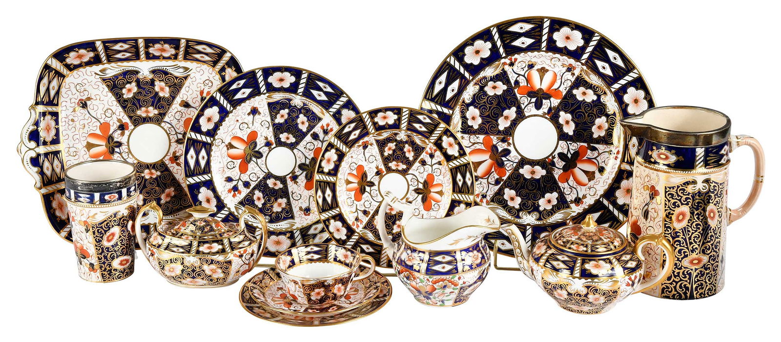 Assembled 100 Piece Imari Porcelain Partial Service, Royal Crown Derby: English, 19th/20th century, predominantly Royal Crown Derby Traditional Imari pattern with other assorted makers, comprising: 24 dinner plates; four luncheon plates; six salad or dessert plates; 16 br