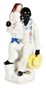 Staffordshire Figurine of Uncle Tom and Eva
