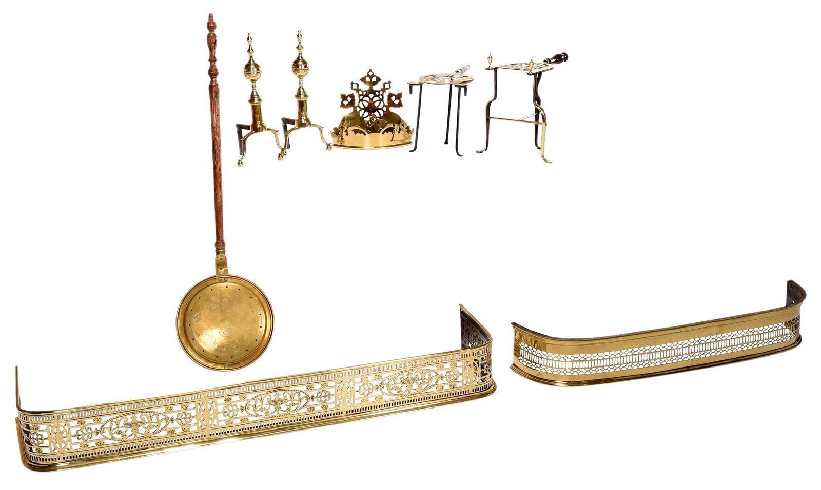 Collection of Eight Brass Fireplace Accessories: 18th/19th century, comprising two fire fenders; two trivets; pair of andirons; bedwarmer; wall pocket; largest 7 x 53-3/4 x 13 in. Provenance: (andirons) Sallea Antiques, New Canaan, Connecticut, June