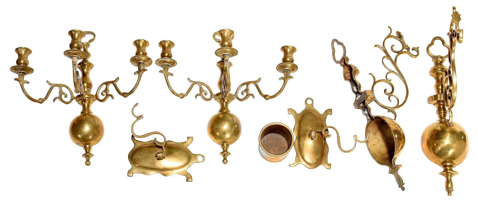 Seven Early Brass Decorative Objects: 18th/19th century, comprising: two pairs of wall hooks; pair of three light wall sconces; small tankard; largest 16 x 4-5/8 x 8-1/4 in. Provenance: (wall sconces) Boedy Antiques, Cleveland, Ohio, Febr
