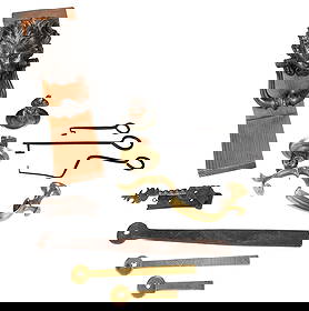 Nine Assorted Door Implements, Knockers, Hinges, and Keys: 19th/20th century, of assorted form and function, including lion mask door knocker, largest 9-3/4 x 4-1/2 x 7 in. Provenance: The Ray J. and Anne K. Groves Collection