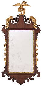 Chippendale Carved and Parcel Gilt Mahogany Mirror: American or British, 18th century, with pierced and parcel gilt leaf decorated crest centering a phoenix, leaf and flower gilt streamers, old distressed mirror plate, 47-1/2 x 22 in.