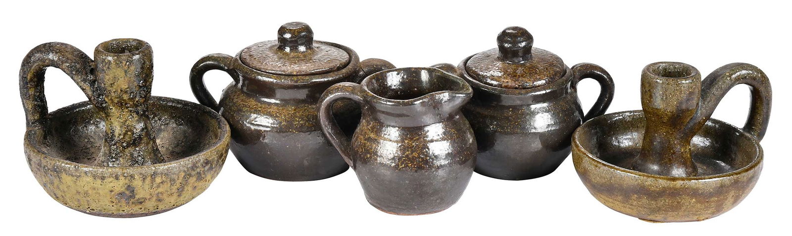 Five Pieces of Arie and Lanier Meaders Pottery: candle holders inscribed "Lanier Meaders" on bases, olive green alkaline glazes, one with glaze bubbles, 3 and 3-1/2 in. tall; small creamer, and two lidded jars, brownish to olive speckled green alka