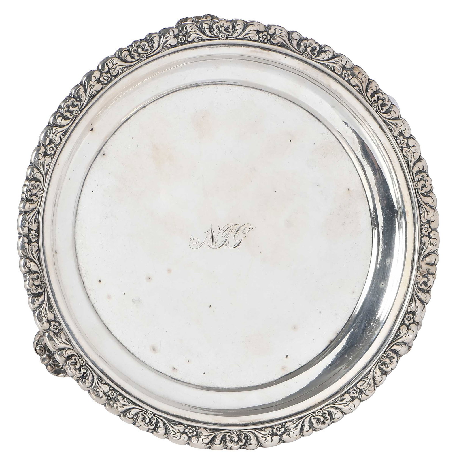 Charleston Coin Silver Small Tray, Hayden & Gregg: South Carolina, mid 19th century, round with floral border, three shell and scroll feet, monogram, marks for retailer Hayden, Gregg & Co. (working 1838-1842), pseudo hallmarks, maker possibly William 