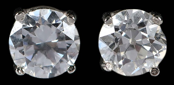 14kt. Pair of Solitaire Diamond Earrings - GIA