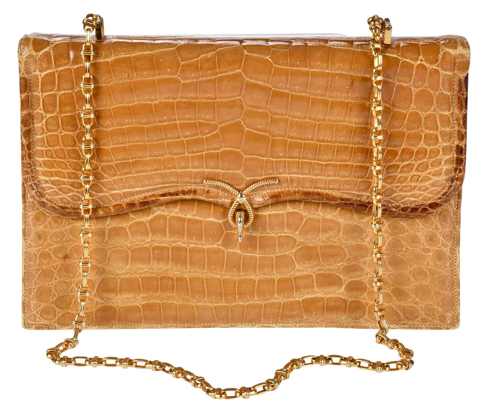 Mark Cross Crocodile Bag: USA/England, late 20th century, gold tone flip clasp and chain strap, 7-1/4 x 11 x 2 in., strap drop 15 in. Provenance: Private Collection