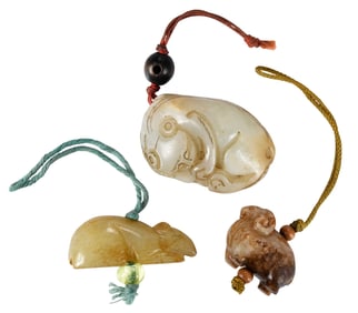 Three Chinese Carved Jade Animal Figural Pendants