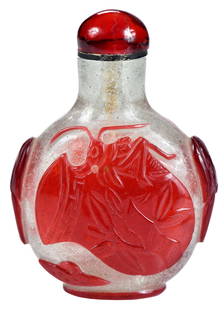 Chinese Camphor Carved Glass Snuff Bottle Red Overlay: rounded form, well hollowed with small opening, cricket design, bat form handles, 3 x2-1/4 x 1-1/4 in. Provenance: Dorothy Torbert Brink Collection, Laguna Hills, California; by descent in family; Pri