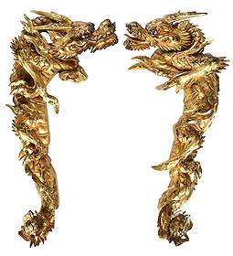 Carved and Gilt Wood Dragon Ornaments: early 20th century, carved wood, glass eyes, label reads "Japan", 34 x 18 x 5 in. Provenance: Estate of Timothy B. Johnston, Russellville, Arkansas