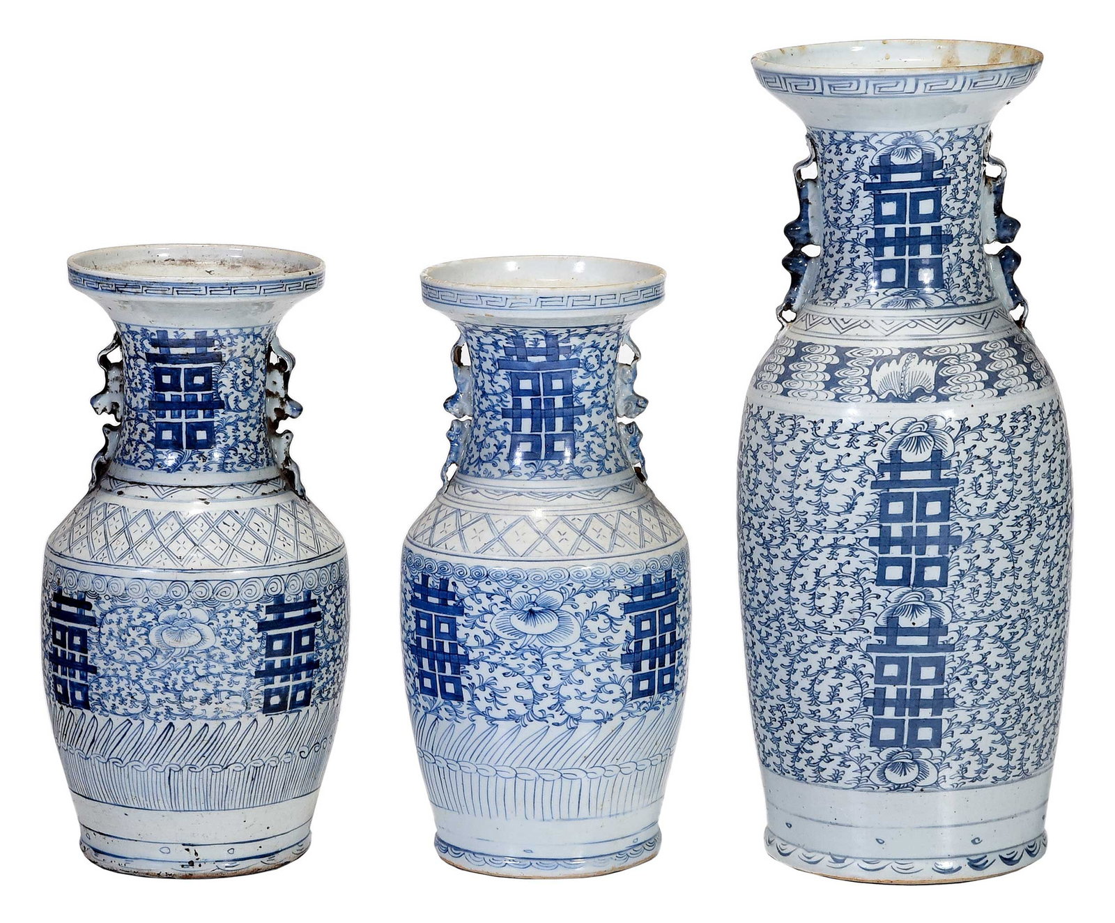 Three Chinese Blue and White Porcelain Double Happiness Vases: 19th century, each with fu dog side handles, largest 23-1/4 x 9 x 9 in. Provenance: Estate of Gary L. Johnson, Virginia