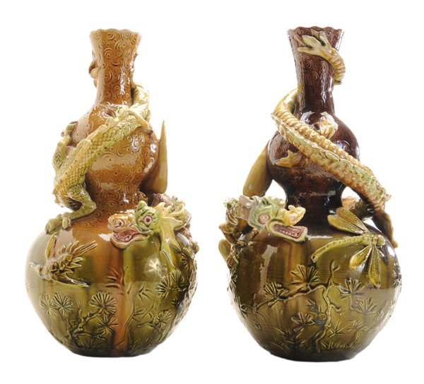 Pair Burmantofts Faience Dragon: Figural Vases British, late 19th century, each double-gourd form with dragon around, one with aubergine ground and dragonfly, one with ocher ground and bird, one with decorator's mark "WH", 15-1/4 in.