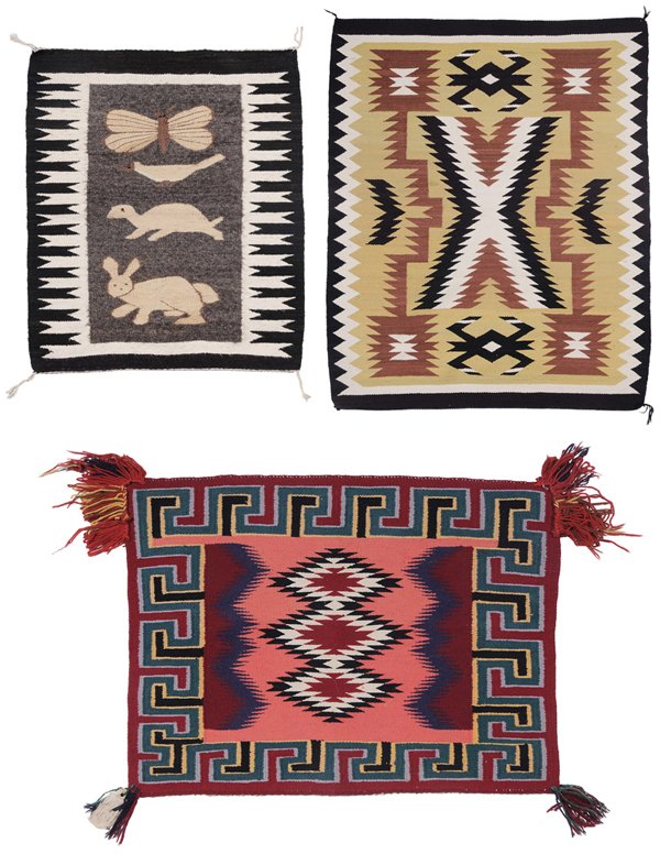 Three Navajo Weavings: Southwestern US, mid 20th century: one storm pattern rug, brown, black, beige, white, zigzag borders at sides, 61 x 50 in., [minor soiling and stains in center, moth damage to one side;] serape style 