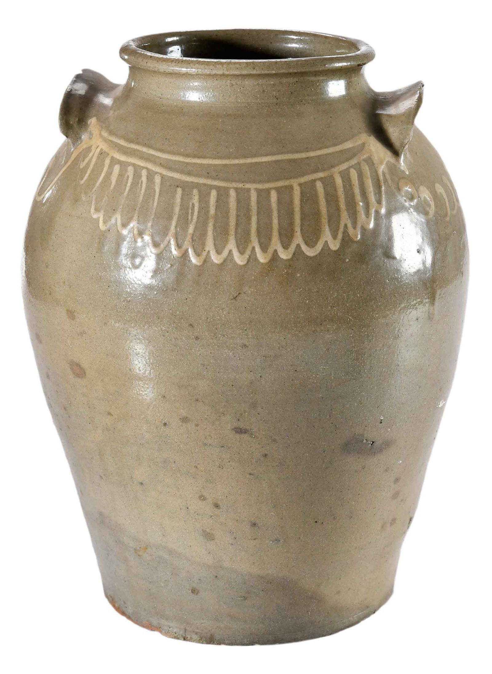 Thomas Chandler Attributed Decorated Edgefield South Carolina Storage Jar: likely made at the Thomas Chandler Pottery, Kirksey's Crossroads, Edgefield District, SC, circa 1850s, light green celadon glaze, applied kaolin slip banner decoration to front and back shoulder of ja