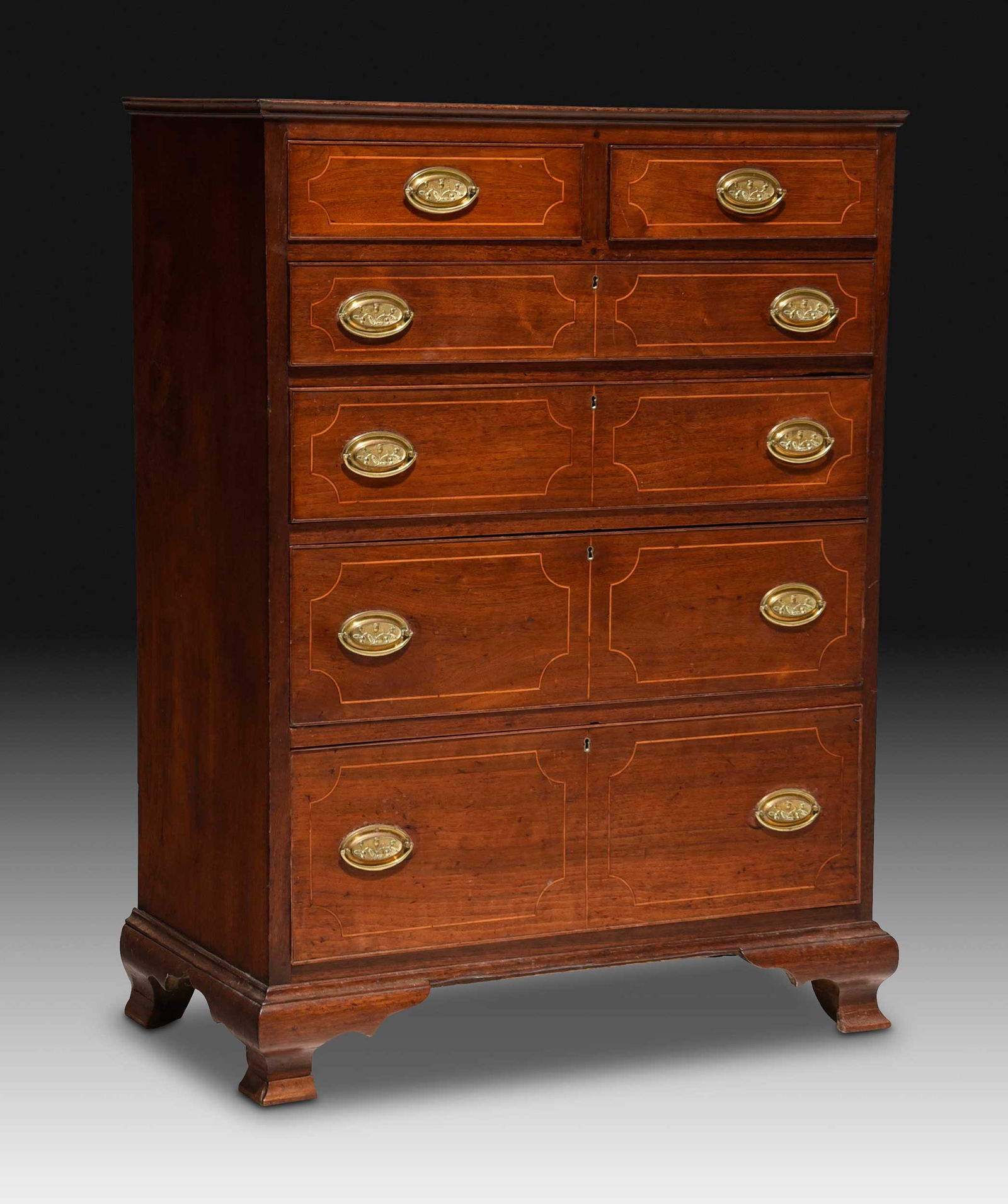 Fine North Carolina Federal Inlaid Walnut Chest of Drawers, MESDA Documented: Piedmont, attributed to James Gheen, early 19th century, yellow pine secondary, mellow old surface, two short over four graduated long drawers, ogee bracket feet, MESDA label to drawer interior, some