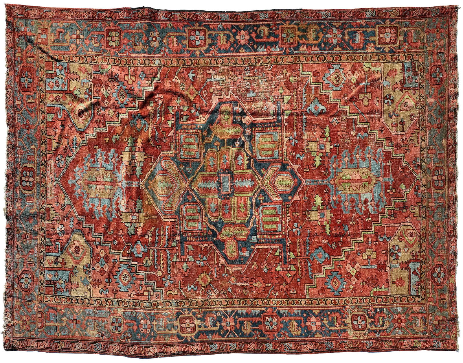 Serapi Carpet: circa 1900, blue medallion on red field, light blue border, 13 ft. 2 in. x 9 ft. 4 in. Provenance: Estate of Joe and Betsy Byerly, Greensboro, North Carolina