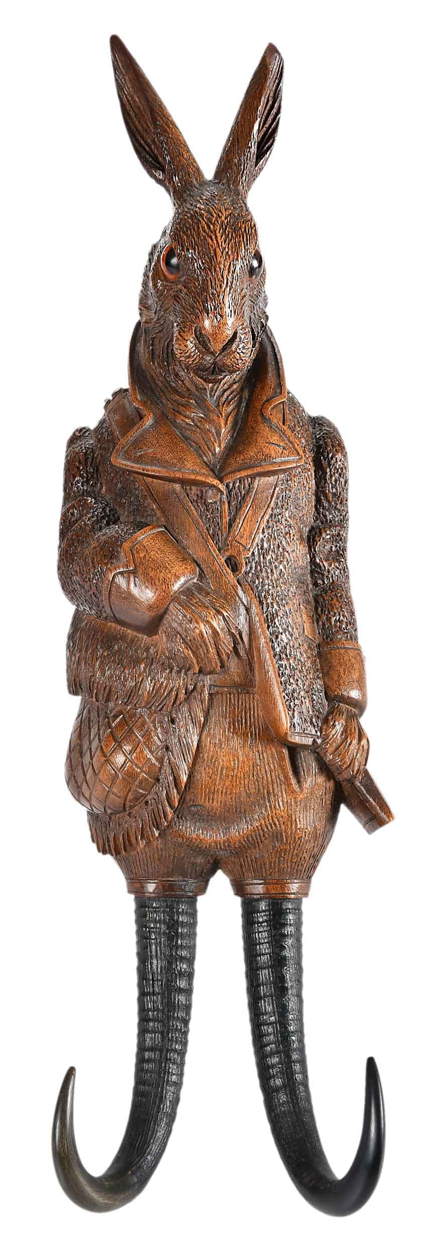 Black Forest Musical Rabbit Form Whip Holder: German, 19th century, in the form of an anthropomorphic rabbit dressed for the hunt, 14-1/2 x 4-1/4 x 3-1/2 in. Provenance: Estate of Joe and Betsy Byerly, Greensboro, North Carolina