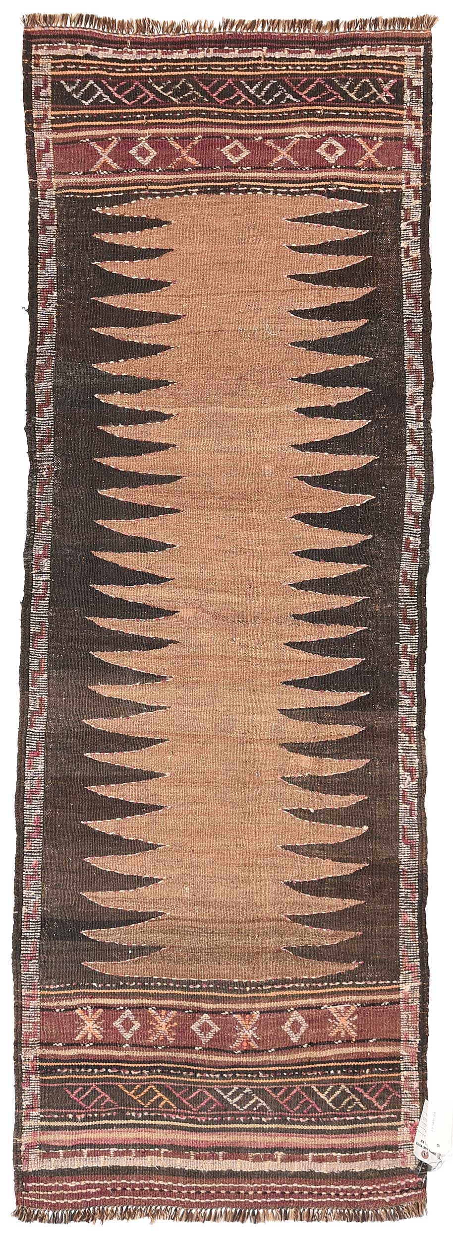 Sofra Kilim Runner: central light brown geometric band on brown ground, thin border with multi tiered bands to ends, 2 ft. 3 in. x 6 ft. 7 in.Provenance: Estate of Susan G. Gary, Louisville, Kentucky; Private Collection