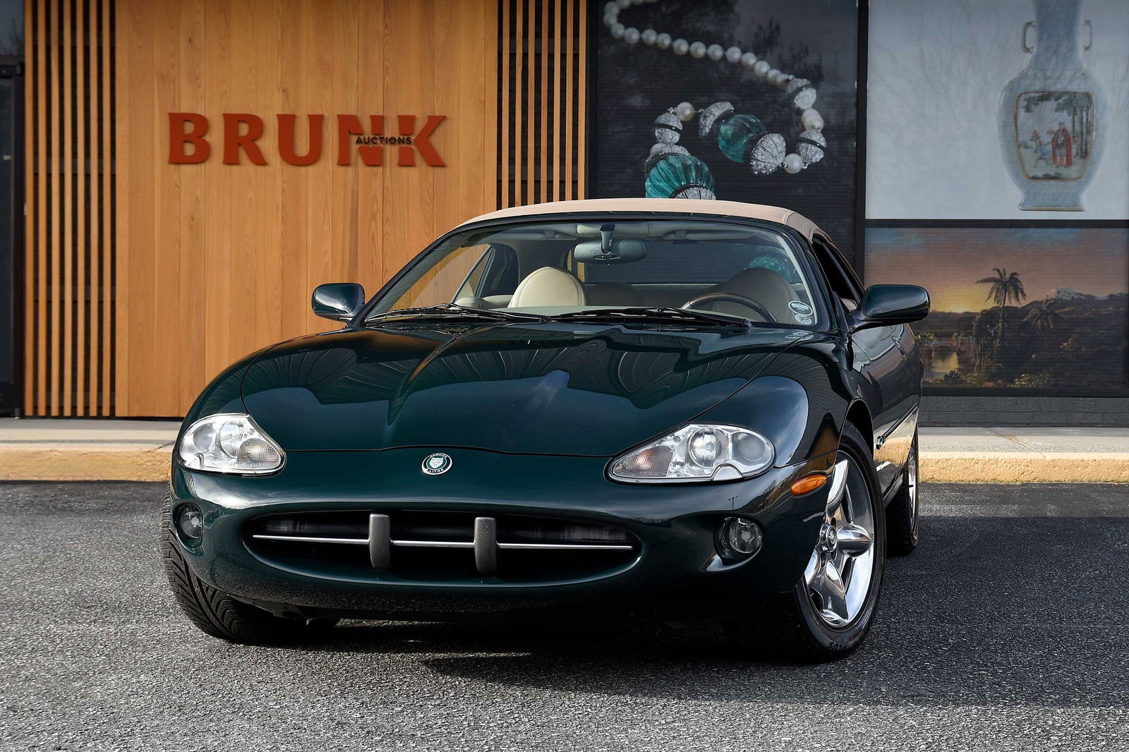 1999 Jaguar XK8: 4.0 V8 engine, 5 speed automatic transmission, odometer reads 19091, 4 wheel disc brakes with ABS, power convertible top, power seats and windows, chrome wheels, Harman Kardon sound system, built in m
