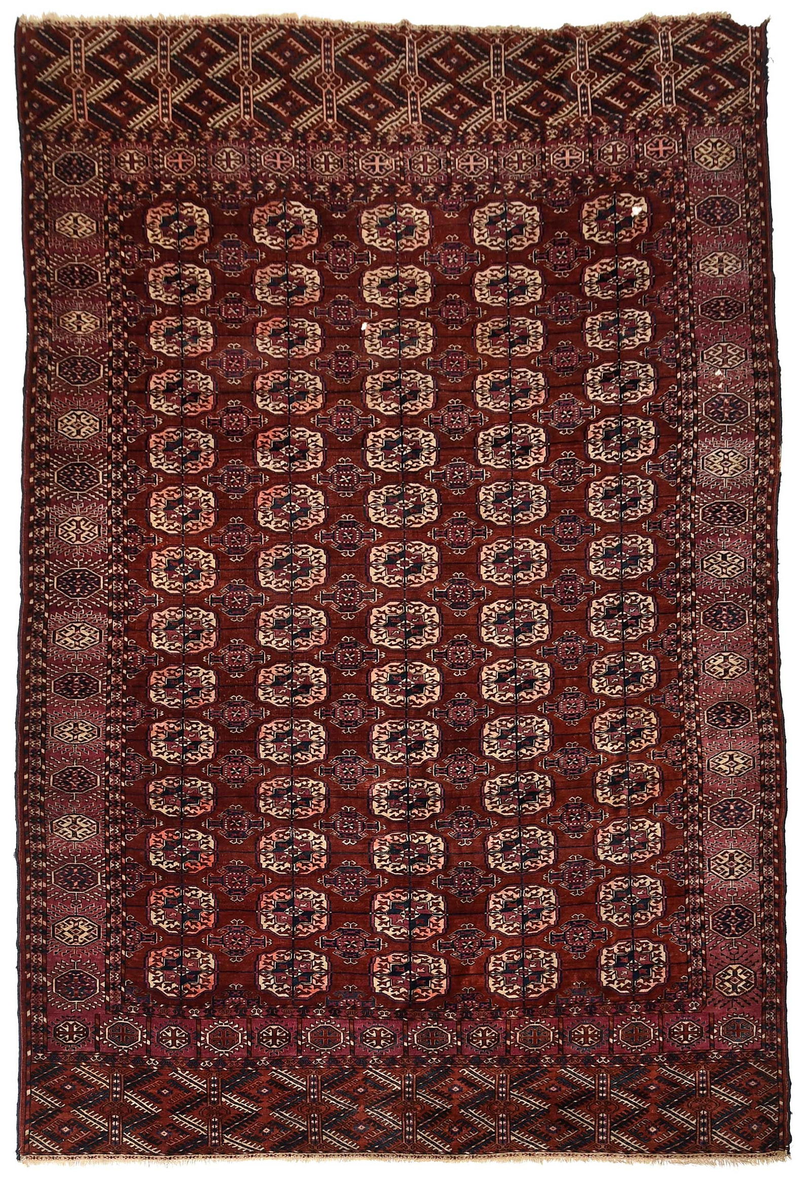 Bokhara Carpet: five rows of gul medallions on red ground, burgundy geometric main border and thick bands to ends, 10 ft. x 7 ft.
