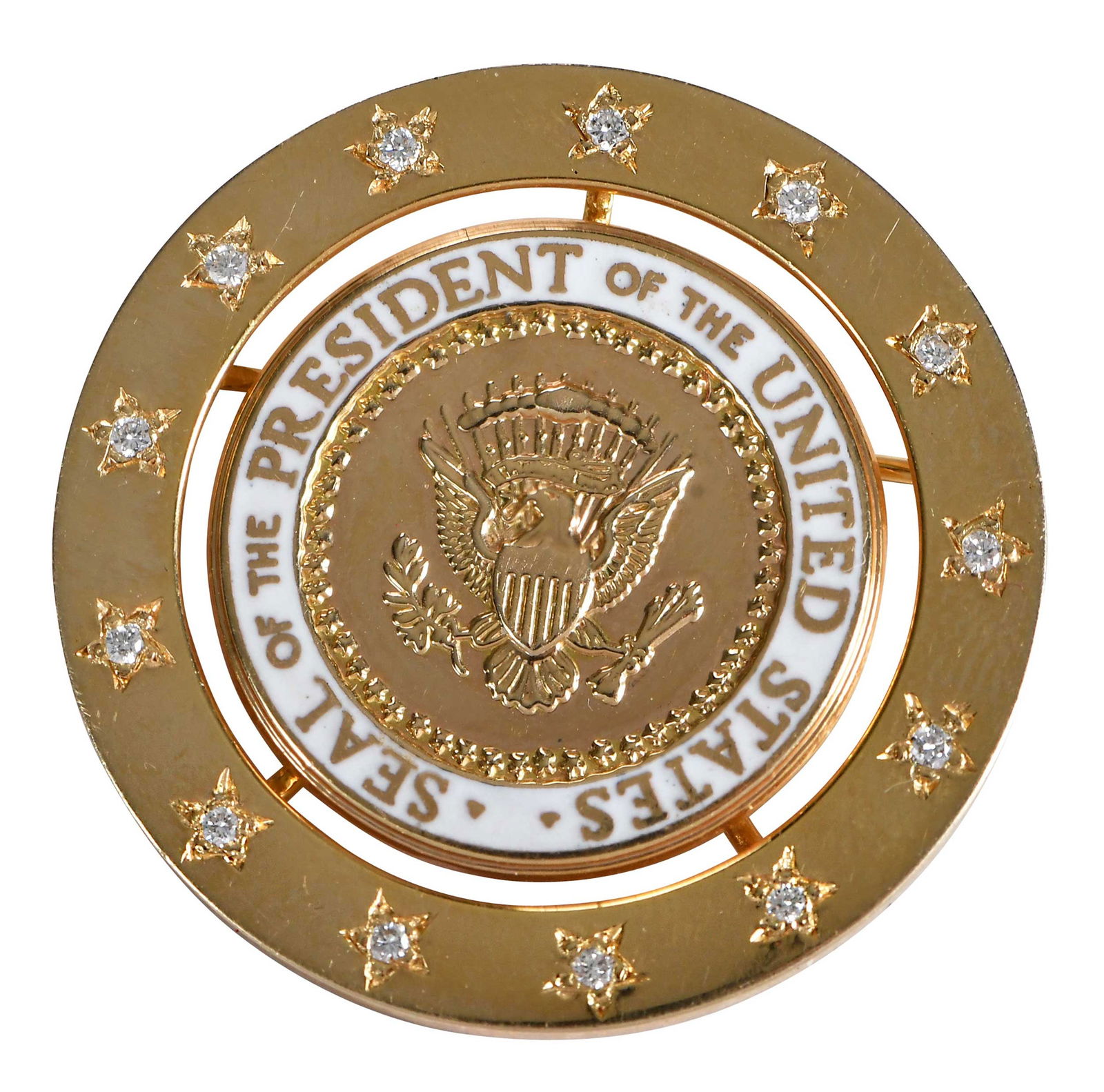 14kt. Enamel Seal of the President of the United States Lapel Pin, Jimmy and Rosalynn Carter: white enamel, 13 round full cut diamonds, marked "14kt", yellow gold, "Seal of the President of the United States", 1-1/4 in. diameter, 9.5 gProvenance: The Estate of Jimmy and Rosalynn CarterNote: