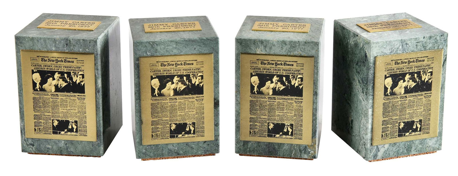 Four Jimmy Carter Related Paper Weights: 20th century, four paperweights commemorating the inauguration of Jimmy Carter, each approx. 3-1/4 x 2 x 2-1/8 in.Provenance: The Estate of Jimmy and Rosalynn Carter