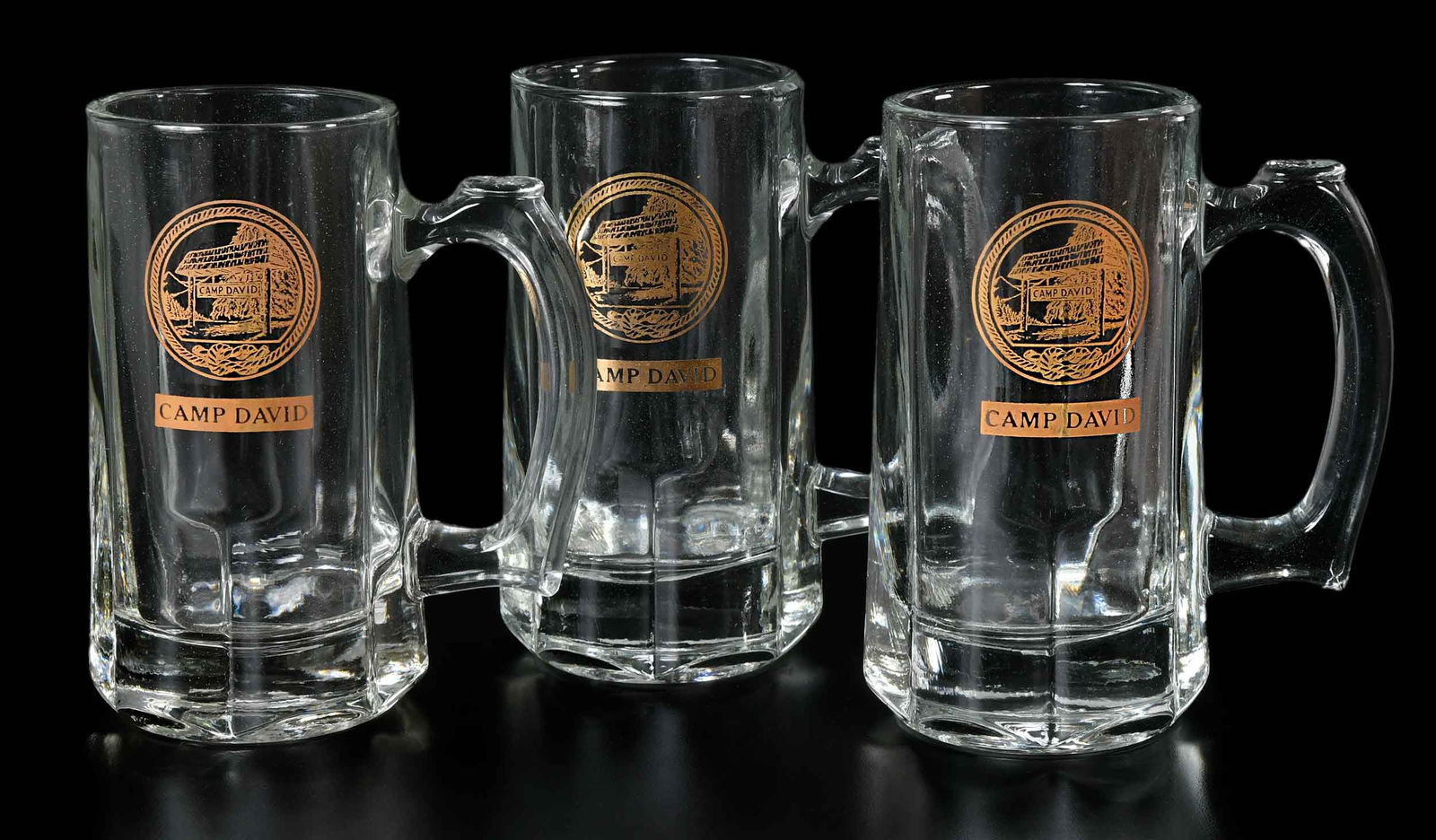 12 Camp David Related Glass Tankards, Jimmy Carter Provenance: American, 20th century, gilt Camp David seal, 6 x 4-3/4 x 2-7/8 in.Provenance: The Estate of Jimmy and Rosalynn Carter
