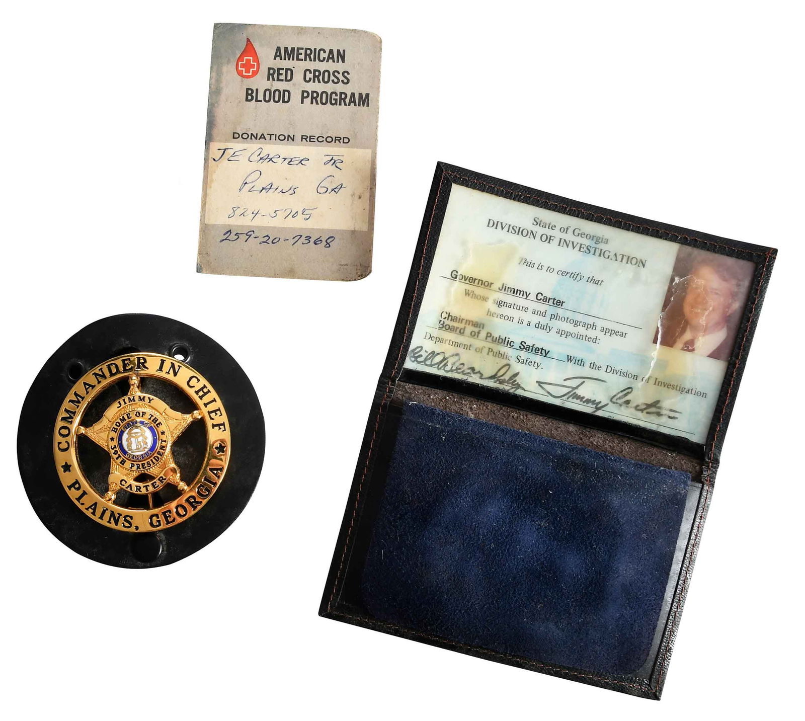 Badge, Identification, Blood Donor Card, Jimmy Carter Provenance: "Commander in Chief" badge for Jimmy Carter of Plains, Georgia; State of Georgia Division of Investigation, Governor Jimmy Carter identification card in leather bifold wallet; American Red Cross