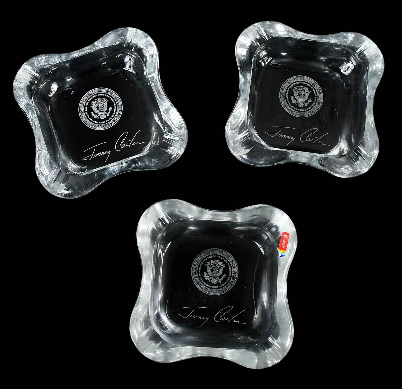 Three Jimmy Carter Presidential Seal Fostoria Crystal Ashtrays: circa 1977-81, each etched with Presidential Seal and signature of Jimmy Carter, 2 x 8 x 8 in. Provenance: The Estate of Jimmy and Rosalynn Carter
