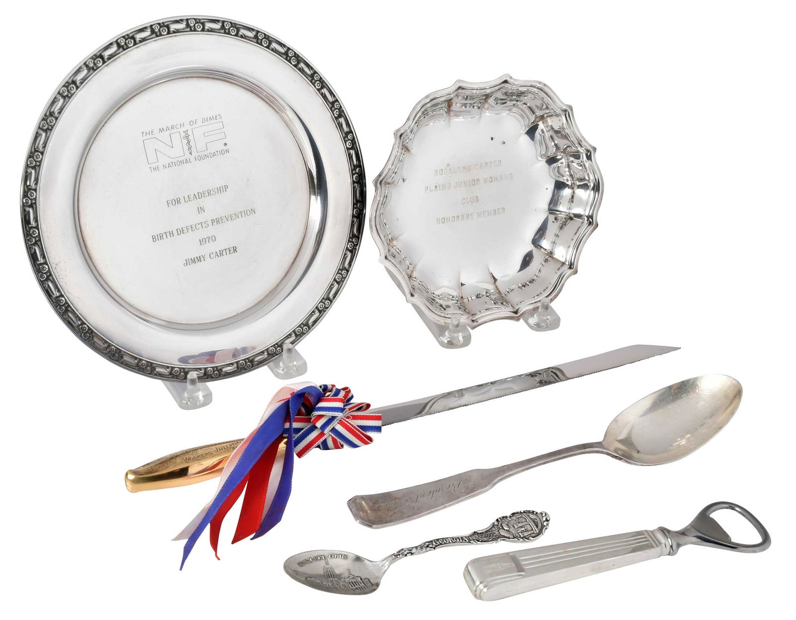 Six Carter and Georgia Silver Items, Jimmy Carter Provenance: late 20th century, including Reed & Barton hollow handle cake knife, B&C Union crest, inscribed "President Jimmy Carter/Vice President Walter F. Mondale/January 20, 1977" and "Presented by Bakery & Co