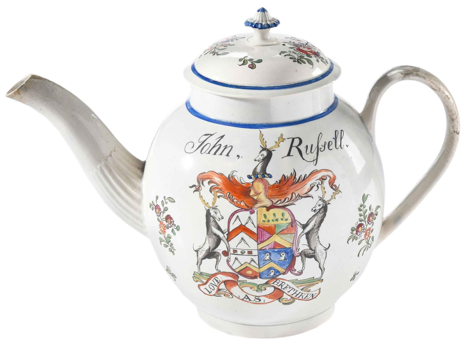 Large English Pearlware Armorial Teapot, Russell: English, late 18th/early 19th century, with coat of arms for the Russell family opposed by text, 9-3/4 x 13-3/4 x 7 in. Provenance: Liza and Wallace Gusler; Estate of Elizabeth Stvan, Williamsburg, Vi