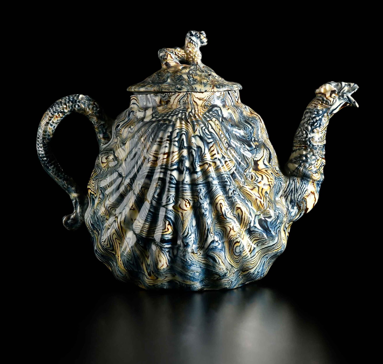 Staffordshire Solid Agateware Pecten Shell Teapot and Cover: 18th century, 5-1/2 x 6-3/8 x 3-1/2 in. Provenance: Collection of Dr. Richard and Carol Lamb, Kennett Square, Pennsylvania