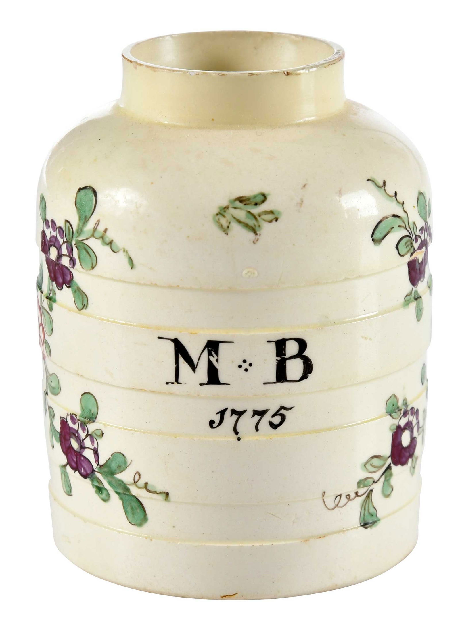 Staffordshire Creamware Dated Enamel Decorated Tea Caddy: 18th century, initialed "M B", dated "1775", and marked "Bohea.Tea", 4 x 2-3/4 x 2-3/4 in. Provenance: Maria & Peter Warren Antiques, Inc. (sticker on base); Collection of Dr. Richard and Carol Lamb,