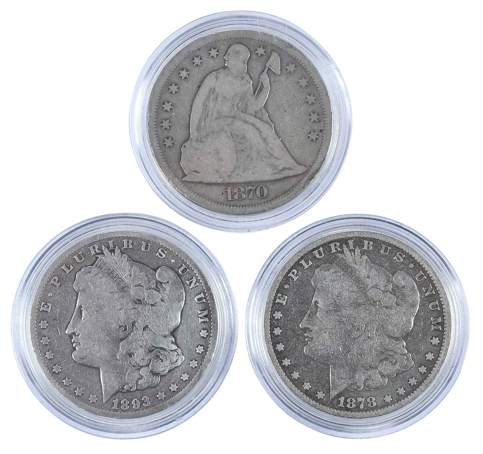 Three Noteworthy Silver Dollars: 1870 Seated Liberty dollar; 1878-CC Morgan dollar; and 1893-CC Morgan dollar Provenance: Private Collection, Lincolnton, North Carolina