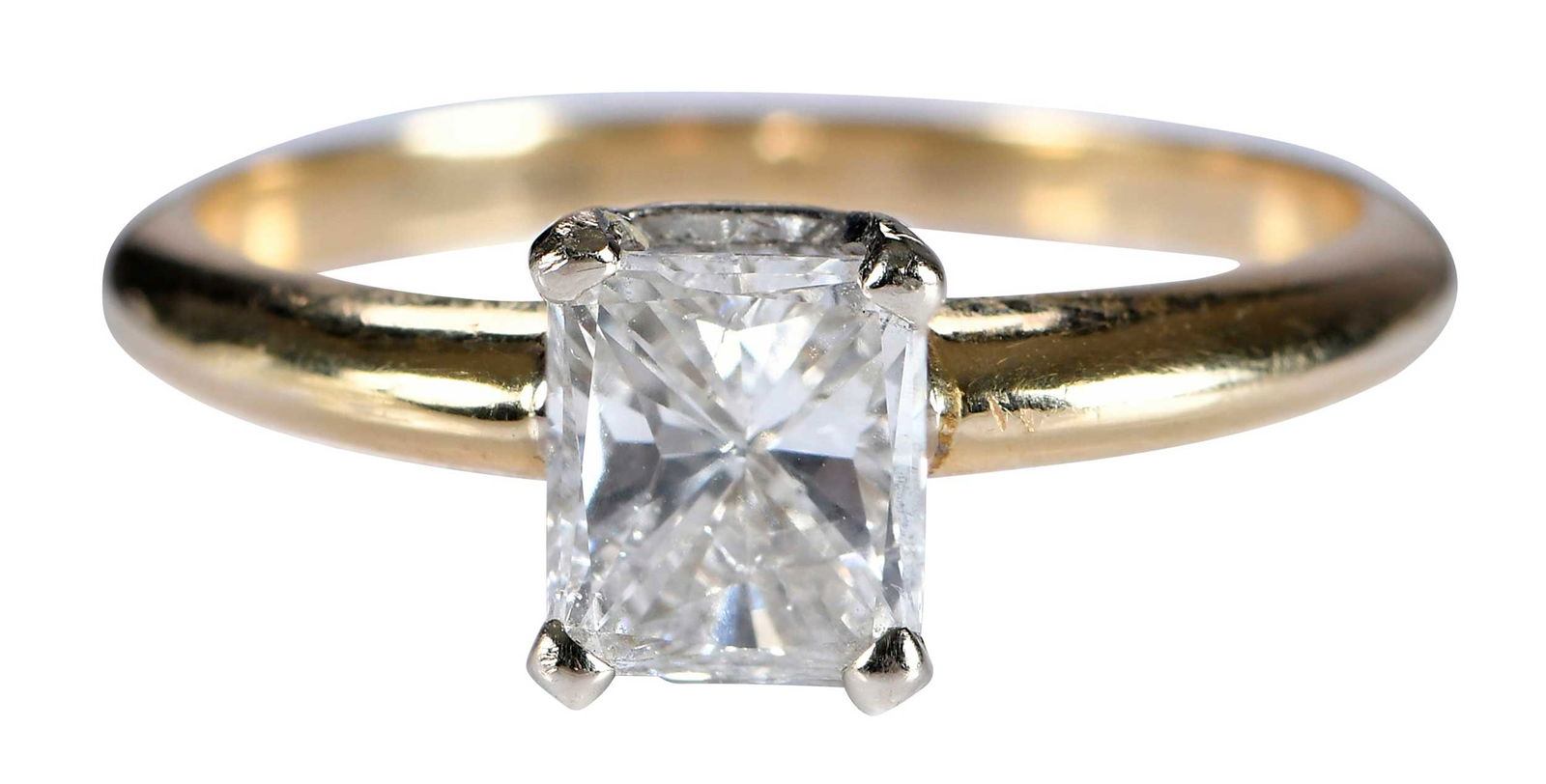 14kt. Solitaire Radiant Cut Diamond Ring: rectangular cut diamond, approx.1.00ct., SI, H-I, marked "14K", yellow gold and white gold, 6-3/4 ring sz., 3.7 g Provenance: Estate of Linda Sargent Thompson, Historic Sesame Lodge, North Augusta, So