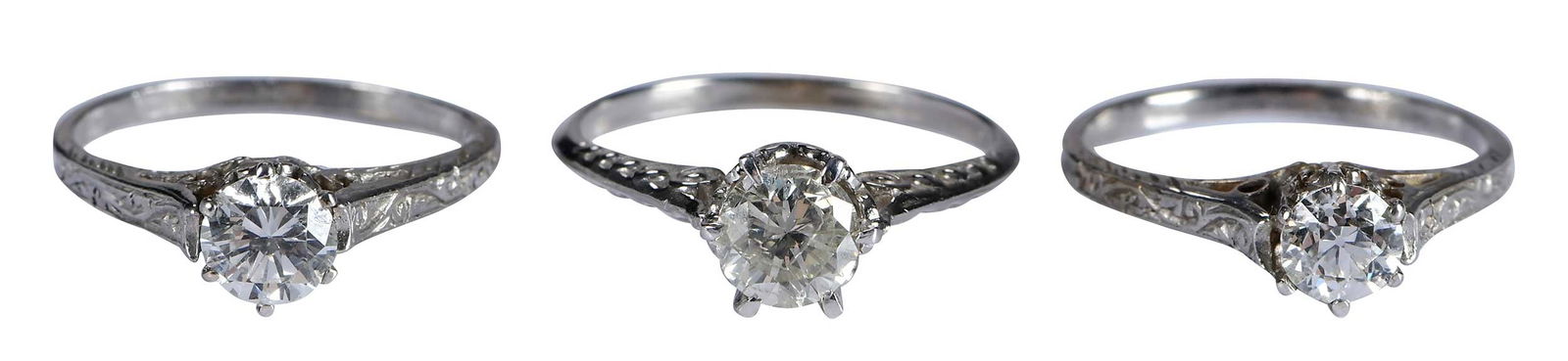 Three 14kt. Vintage Style Solitaire Diamond Rings: round brilliant cut diamond, approx. 0.55ct., SI, H-I, marked "14K", white gold, 5-3/4 ring sz., 2.0 g; transitional cut diamond, approx. 0.50ct., VS, G-H, marked "14K", white gold, 6 ring sz., 2.1 g;