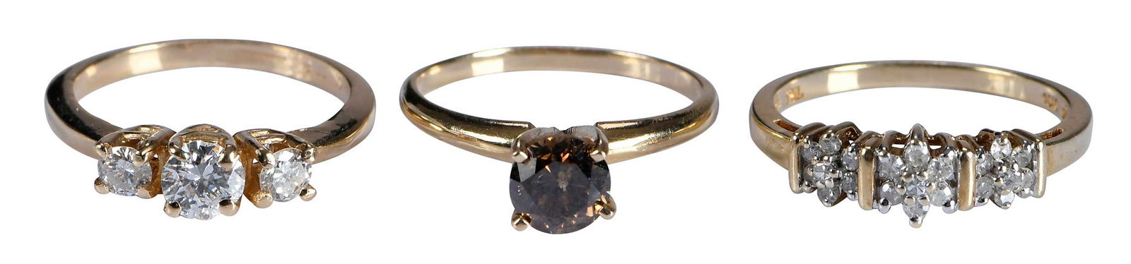 Two 14kt. Diamond Rings and One 10kt. Diamond Band: three round brilliant cut diamonds, approx. 0.75ctw., side diamonds VS, center diamond, I, H-I, marked "14k, S", yellow gold, 5-3/4 ring sz.; round brilliant cut diamond, approx. 0.80ct., SI,