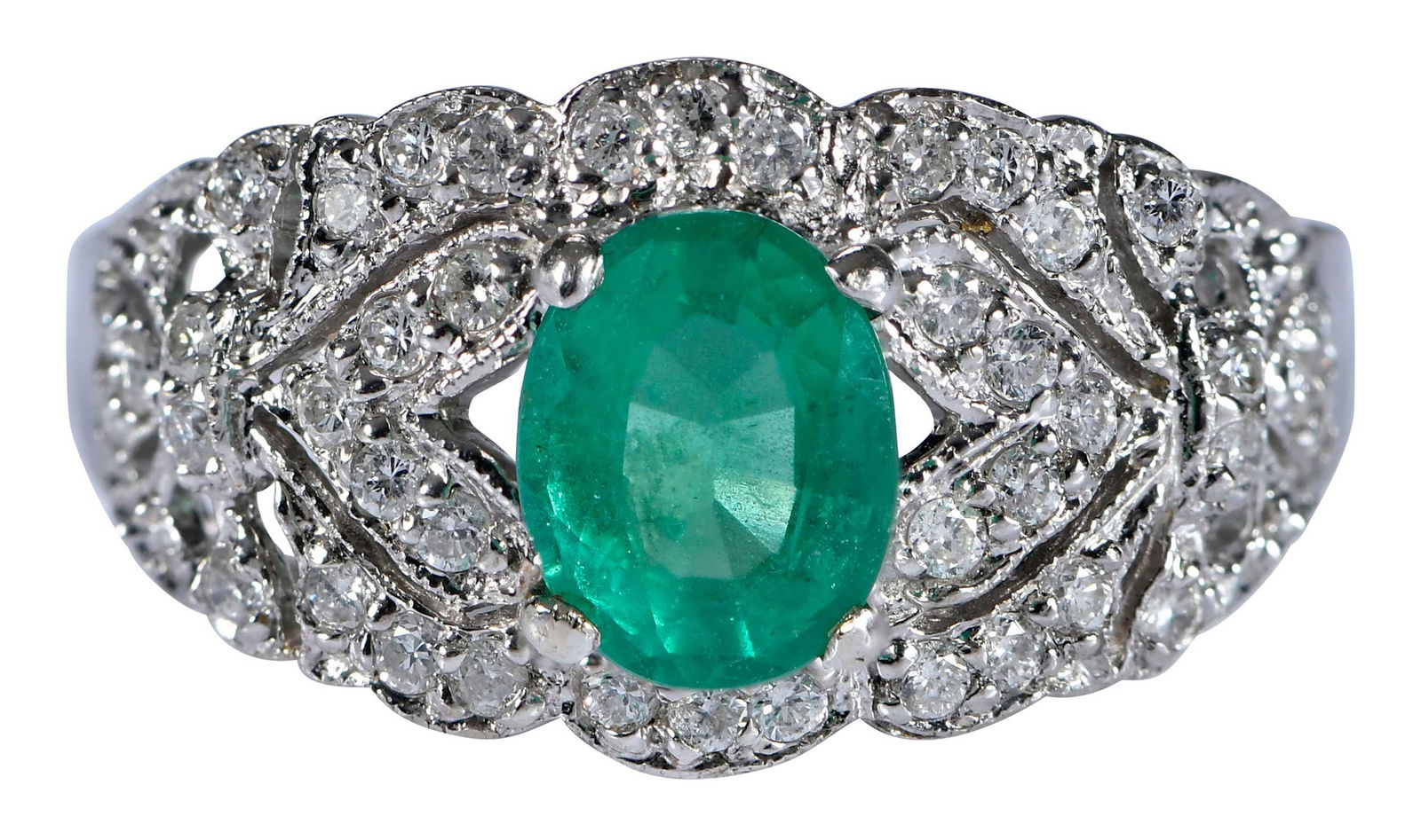 18kt. Bypass Emerald and Diamond Fashion Ring: asscher cut emerald, approx. 0.70ct., seven round brilliant cut diamonds, approx. 0.25ctw., channel set, marked "18K, J18", yellow gold, European shank, 7-1/2 ring sz., 10.6 g Provenance: Estate of Li