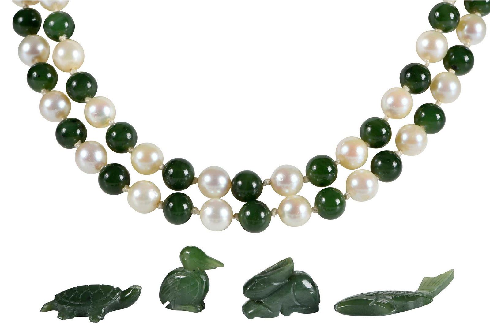 Strand of Pearls and Jade Beads with Jade Animal Carvings: alternating round white pearls and jade beads, approx. 8.0mm - 8.5mm, clasp marked "14K", yellow gold, 33 in. length; carved fish, turtle, rabbit, bird, approx. 1/2 - 3/4 in. width, total weight 89.0