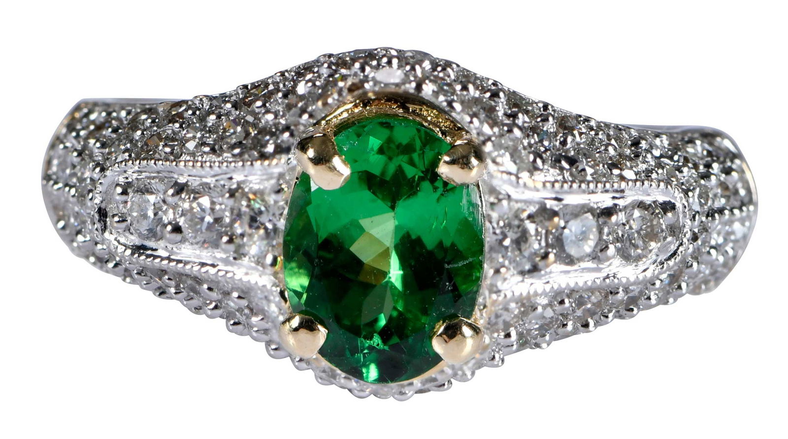 14kt. Tsavorite Garnet and Pave Diamond Ring: oval full cut tsavorite garnet, approx. 1.10ct., accented by round full cut diamonds, VS, G-I, marked "RRJ, 14Kt", yellow gold and white gold, 6-3/4 ring sz., 4.5 g Provenance: Estate of Linda Sargent