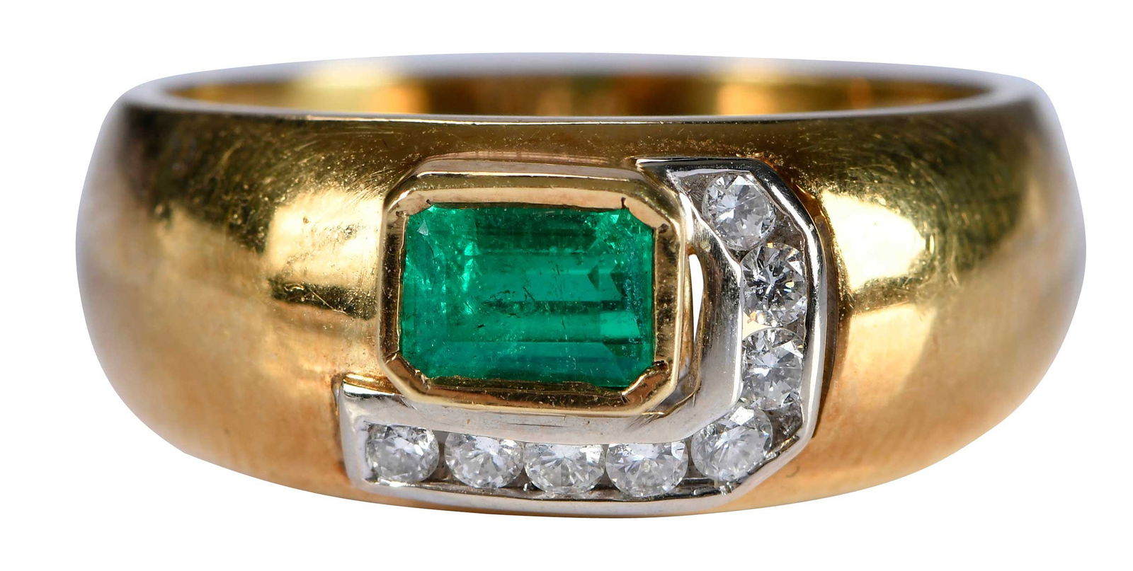 18kt. Emerald and Diamond Modern Style Band: emerald cut emerald, approx. 0.50ct., eight round full cut channel set diamonds, marked "18Kt", yellow gold, diamonds are set in white gold, 7-3/4 ring sz., 5.6 g Provenance: Estate of Linda Sargent T