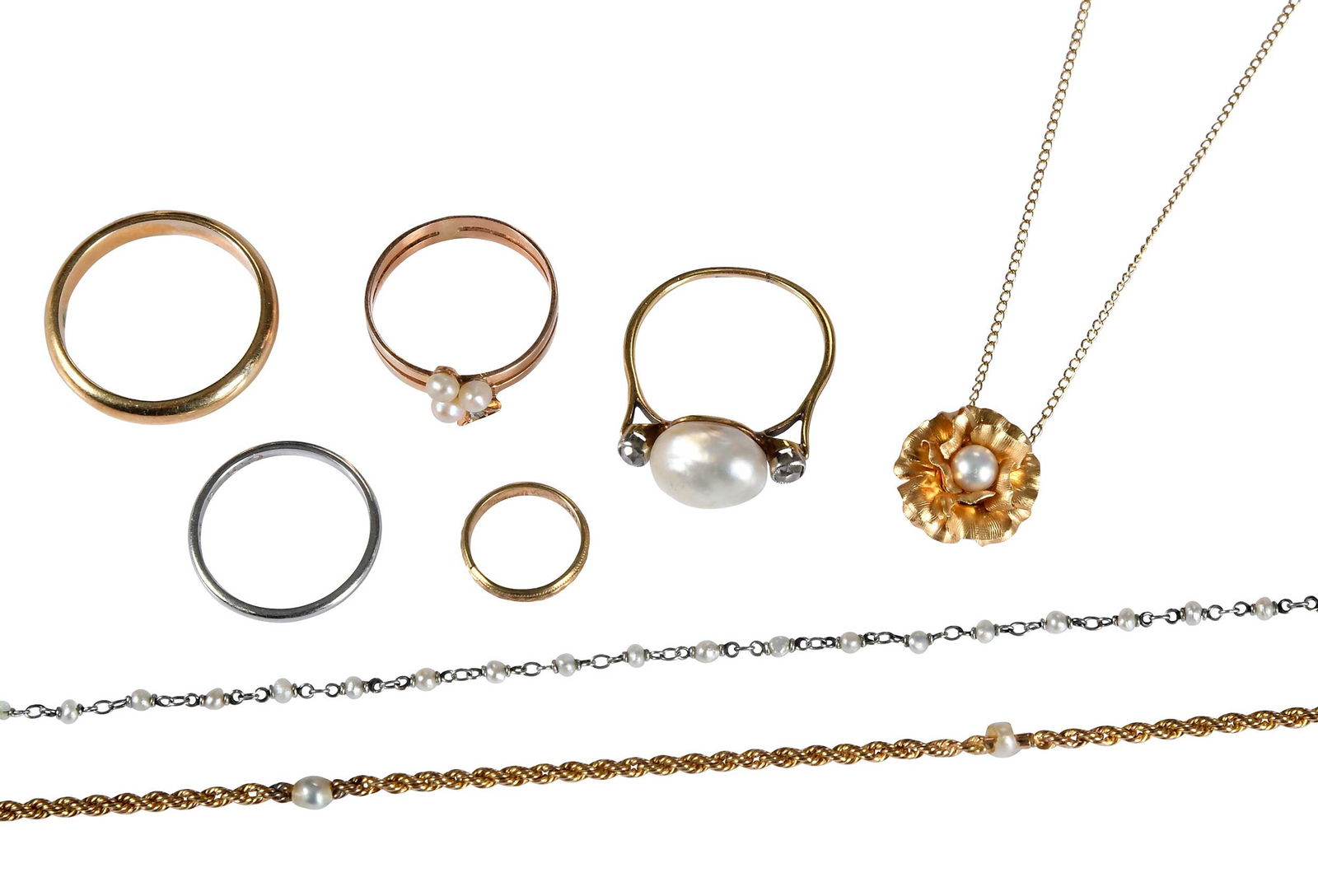 Collection of Gold Rings and Necklaces with Pearls: flower pendant with pearl center, marked "14K", yellow gold, 15 in. length, 2.2 g; rope chain with five fresh water pearls, tests 18kt. yellow gold, 16 in. length, 7.2 g; salt water seed pearls, tests