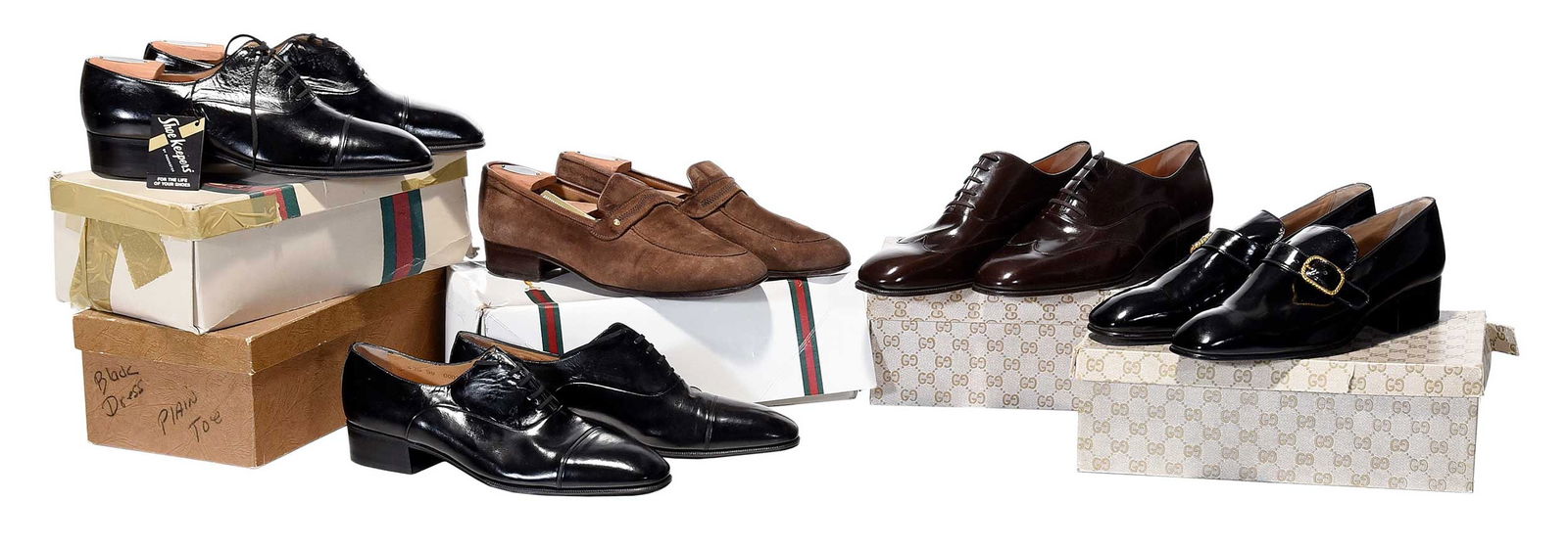 Five Pairs of Men's Gucci Dress Shoes: Italy, mid to late 20th century, each marked size "43" (US 9), comprising: pair of brown suede loafers; pair of brown leather wing tip oxfords; two pairs of black leather cap toe oxfords; pair of blac