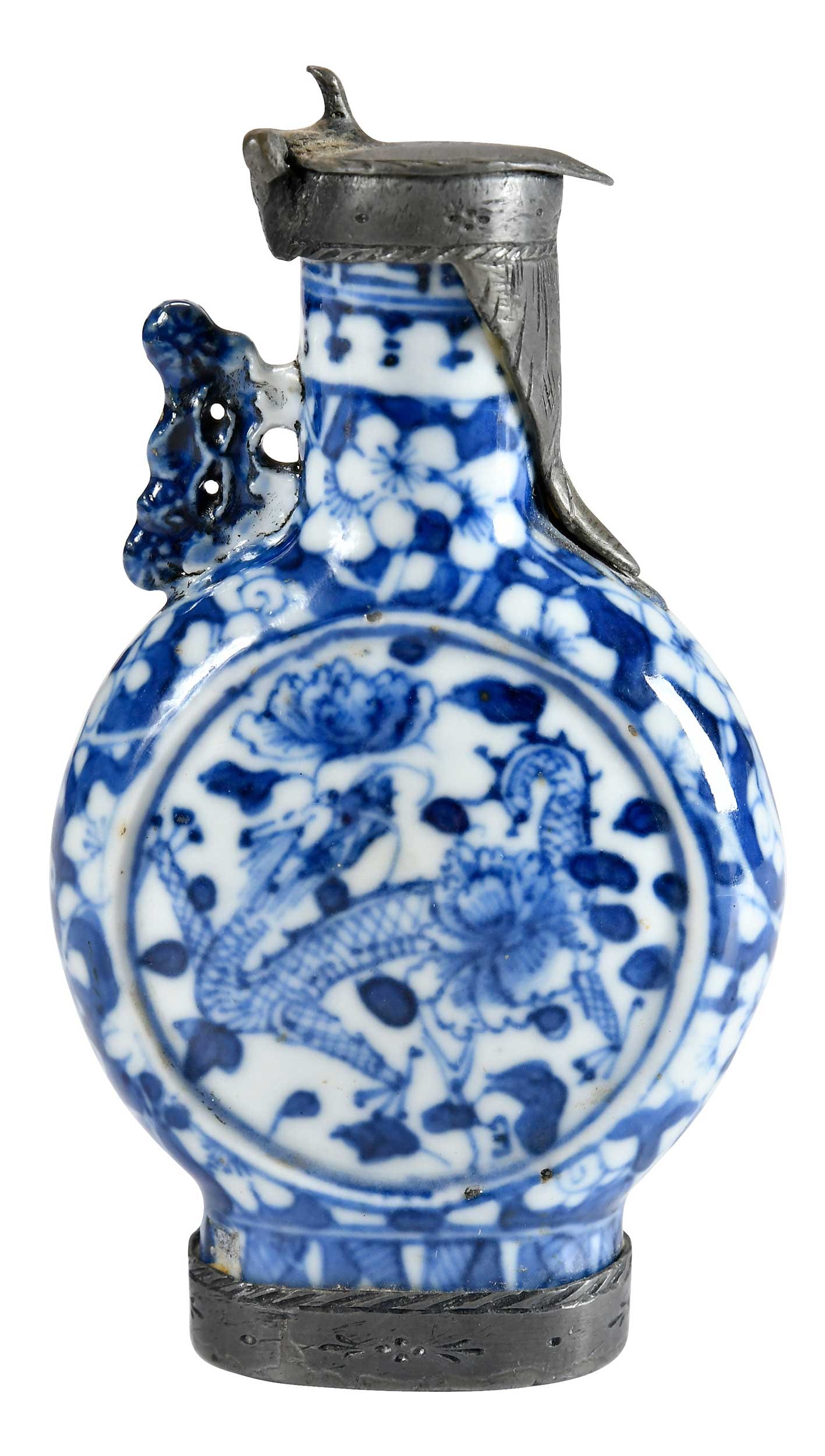 Small Chinese Blue and White Moon Flask: depicting a dragon amongst flowers, with later pewter mounts, mark to mounting on base, 5-1/2 x 3 x 1-1/8 in. Provenance: Estate of Linda Sargent Thompson, Historic Sesame Lodge, North Augusta, South