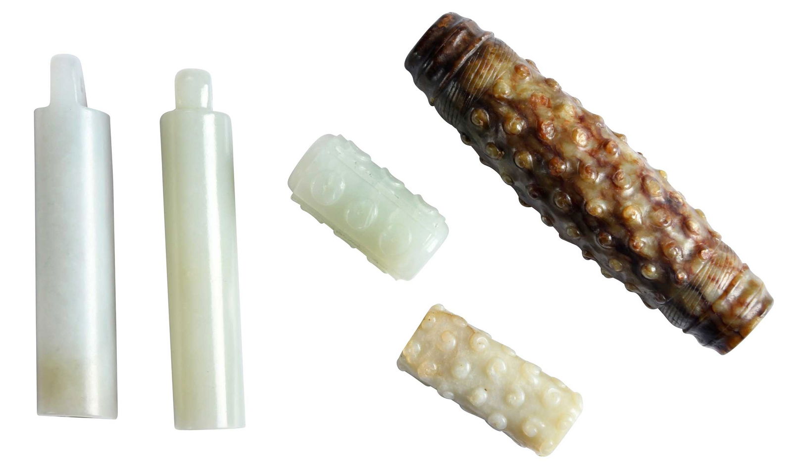 Five Carved Cylinder Jade Beads: largest 3-5/8 x 7/8 x 7/8 in. Note: These items tested as nephrite on the Presidium Gem Tester II. 